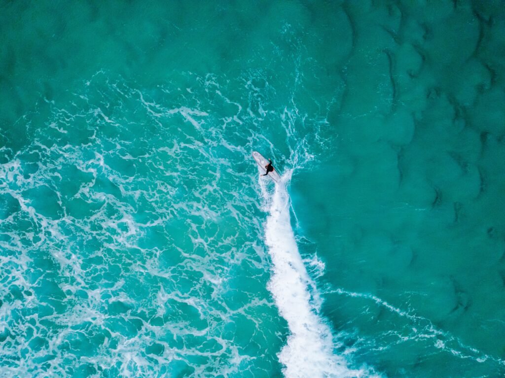 a person on a surfboard in the ocean