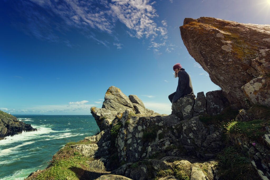 man-sitting-on-a-rock